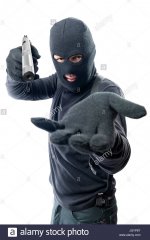 armed-robber-requires-money-and-aims-at-the-camera-JGYP8T.jpg